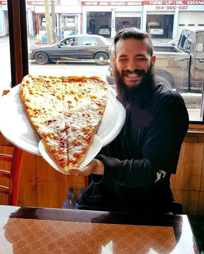 A Very Large Slice Of Pizza And Finished It