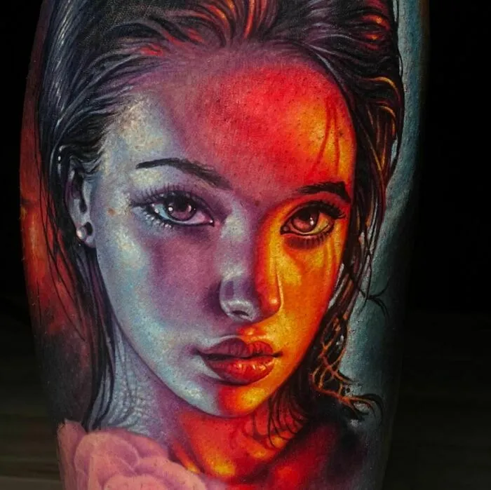 Realistic girl face tattoo showcasing stunning detail and lifelike features.