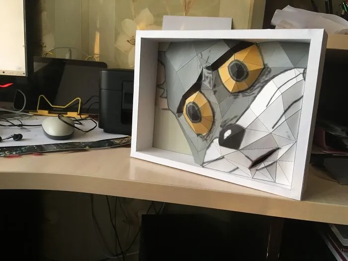 picture of a cat made out of a paper