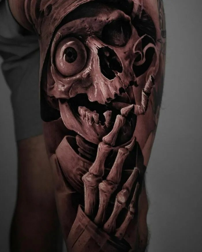 Realistic tattoo of a skeleton smoking a cigarette, showcasing intricate detailing.