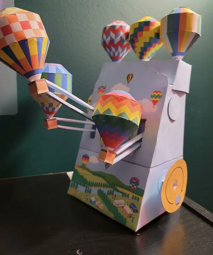 colorful paper flying hot air balloons 