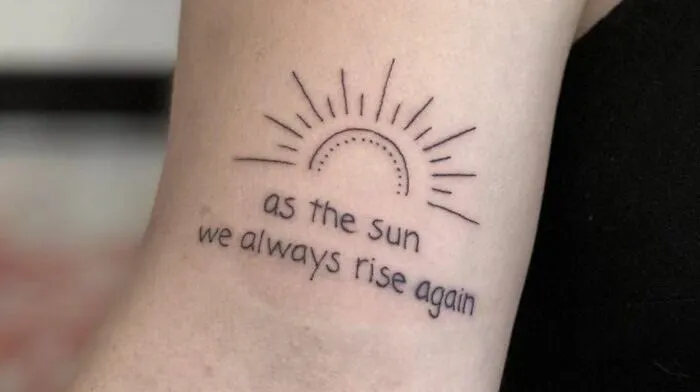 “As The Sun, We Always Rise Again” Lettering Tattoo