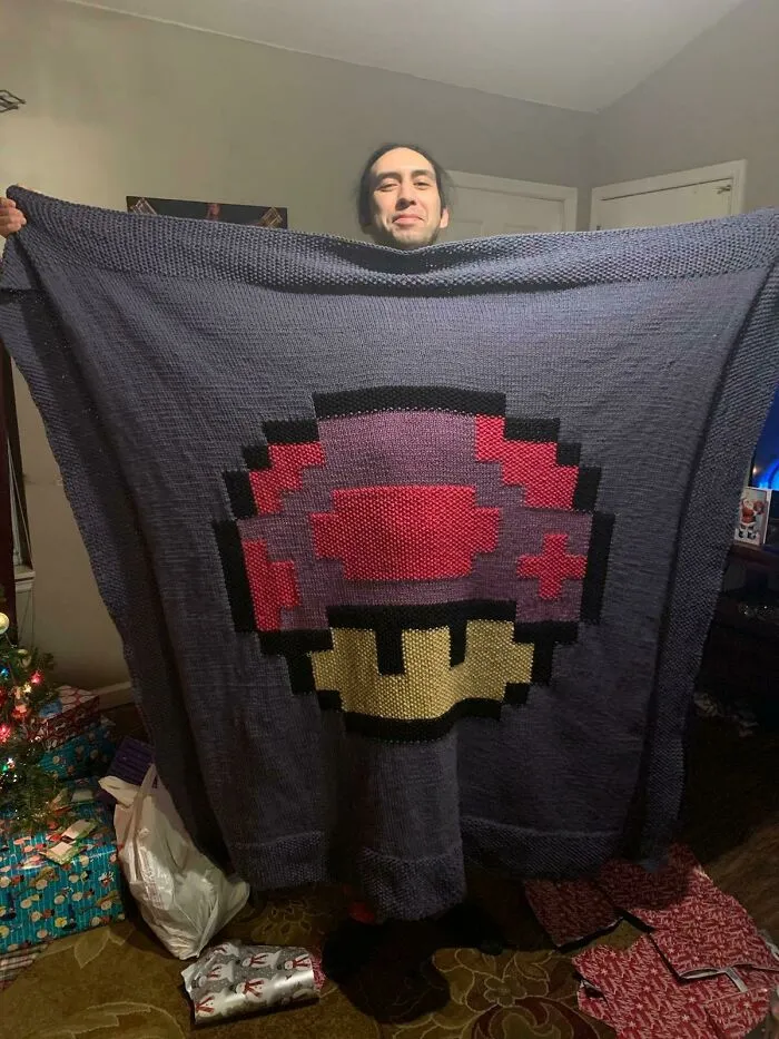 Mi mamá me hizo esta manta para Navidad. Ella es impresionante con sus manos
