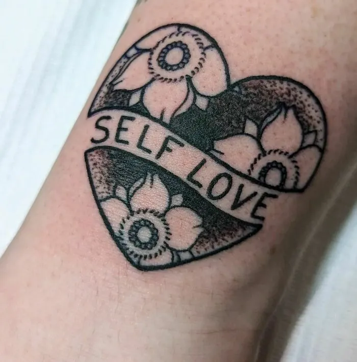“Self Love” Lettering Tattoo with Flowers