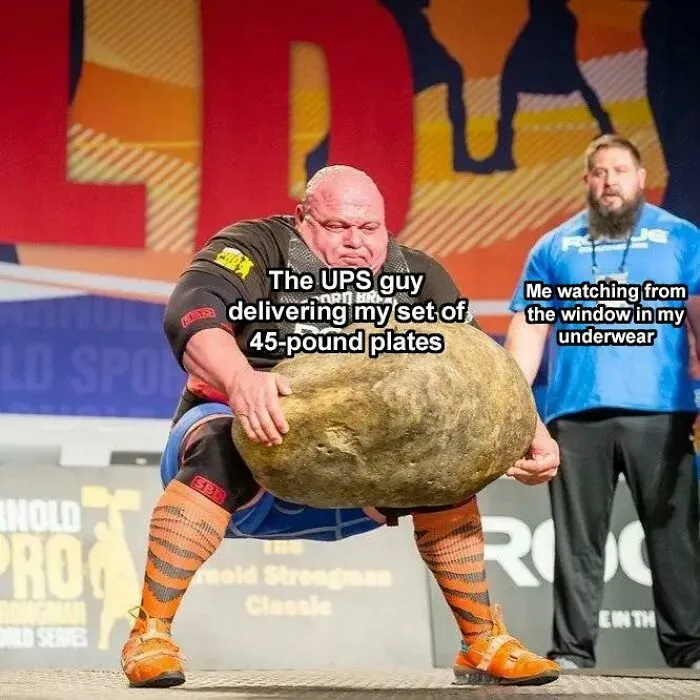 Strongman lifting a heavy rock, captioned with relatable gym meme humor for gym rats.