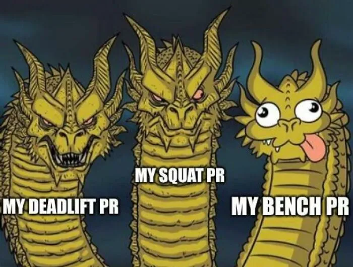 Three-headed dragon gym meme depicting deadlift PR, squat PR, and bench PR expressions.