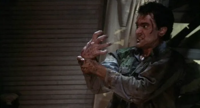 Ash covered in blood 