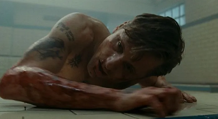 Nikolai crawling on the bathroom floor 