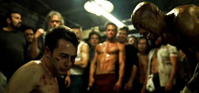 two man fighting o the ring 