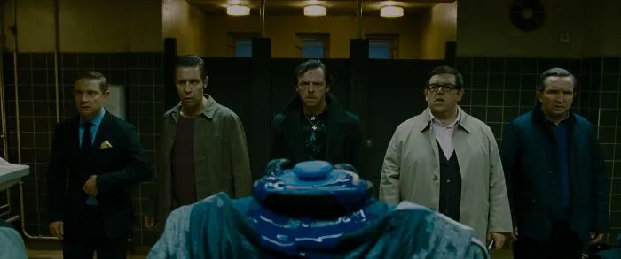 Man standing in front of  Alien Androids