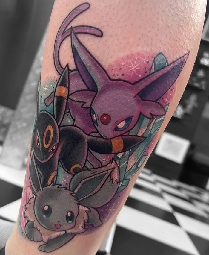 Colorful calf tattoo featuring unique designs of stylized animal characters, showcasing creative and cool tattoo art.