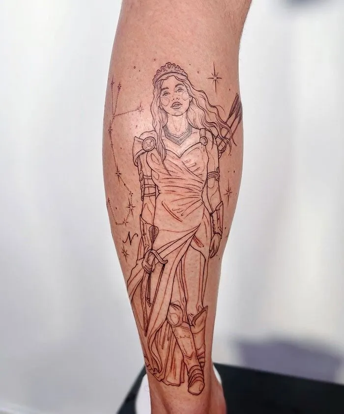 Unique calf tattoo depicting a warrior woman with constellations and stars.