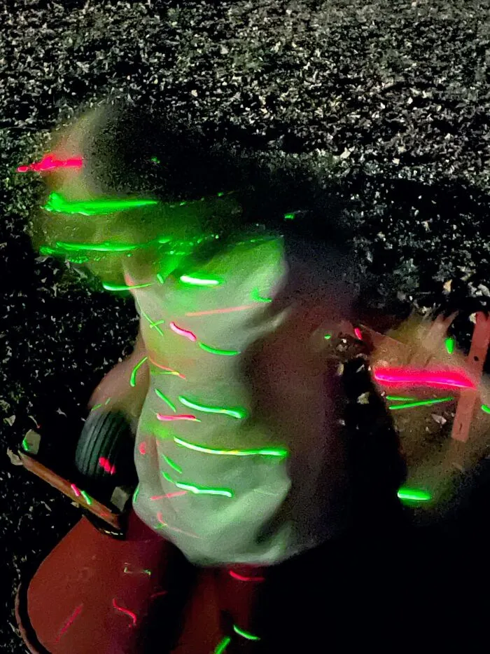 My Granddaughter Dancing In The Laser Light Show