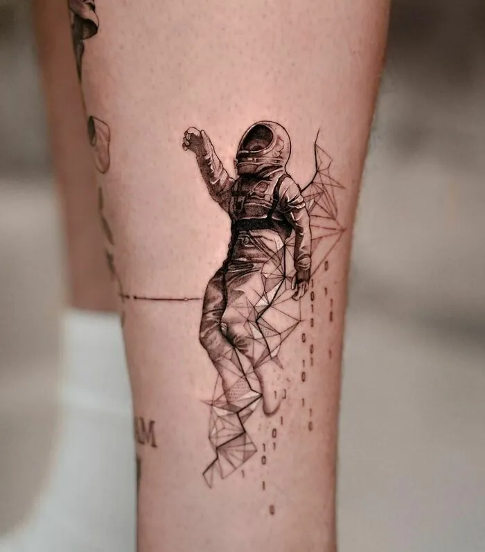 Tattoo of an astronaut with geometric designs, perfect for astrology fans who love space-themed art.