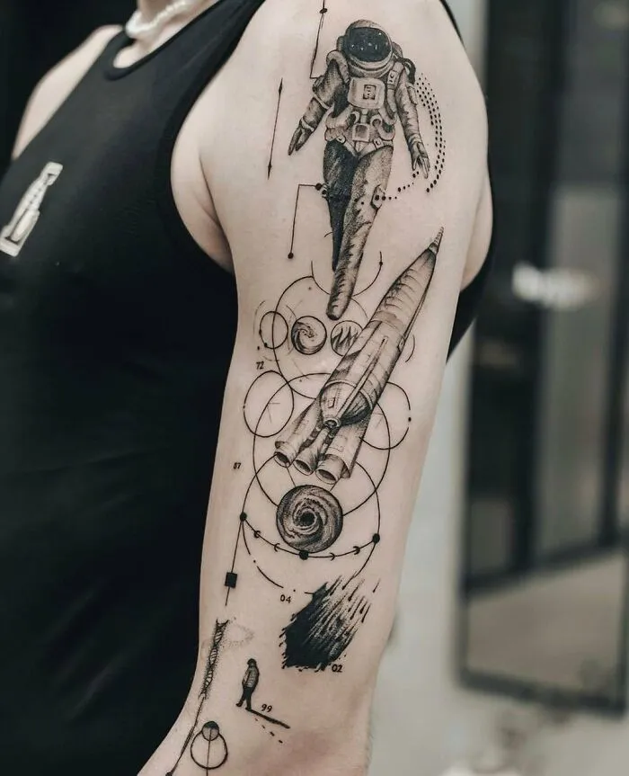 Astronaut And Rocket Arm Tattoo