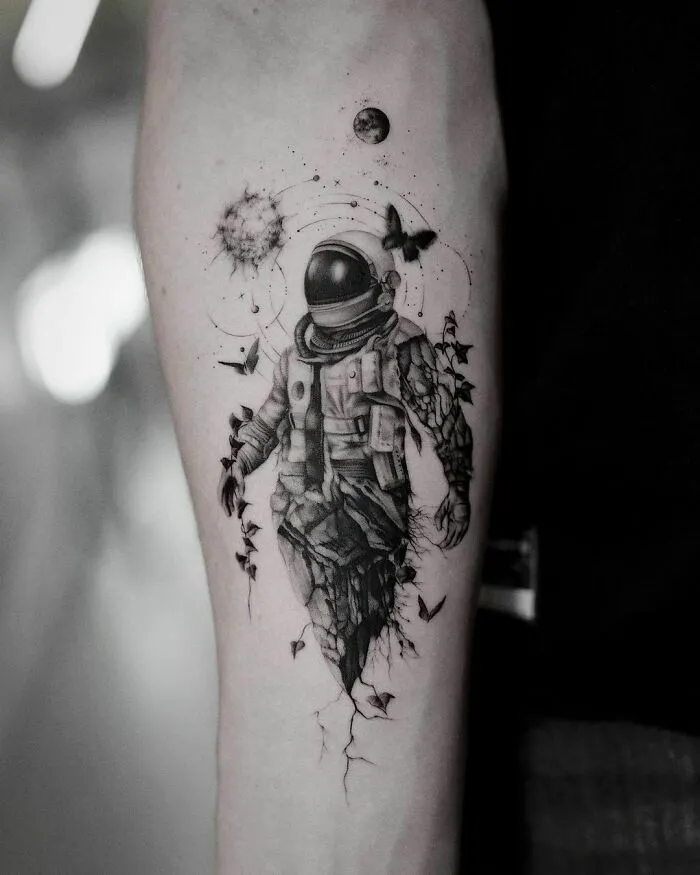 Astronaut Arm Tattoo