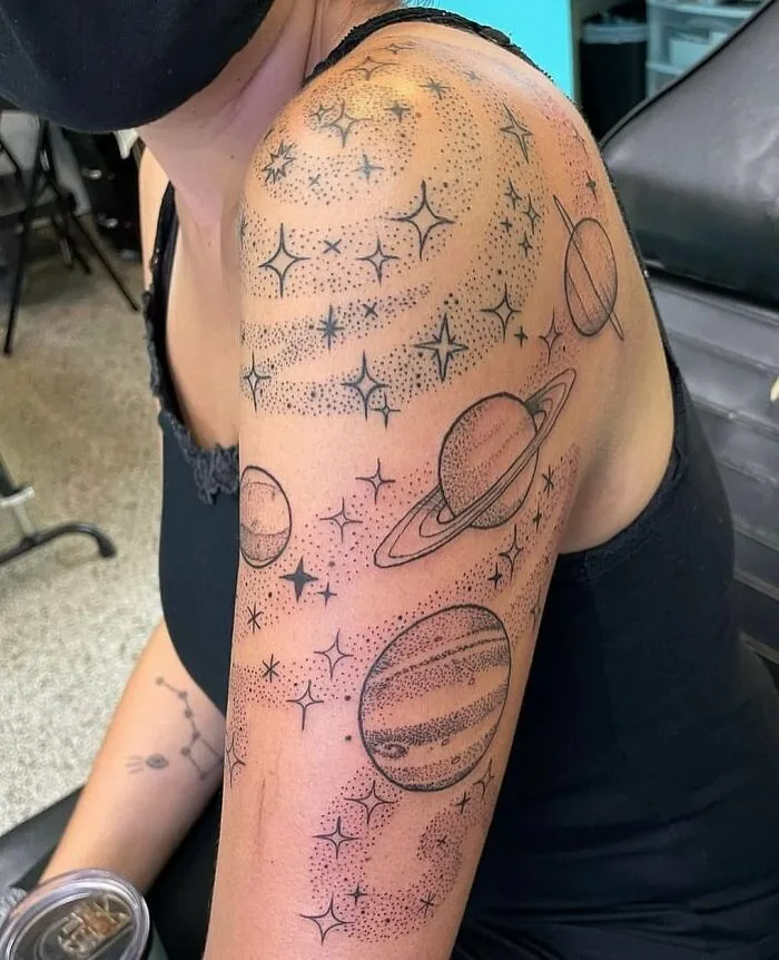 Stardust And Planets Arm Tattoo