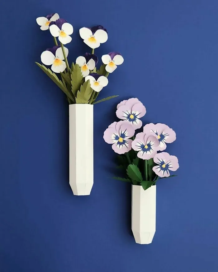 Pansy made out of a paper in vases