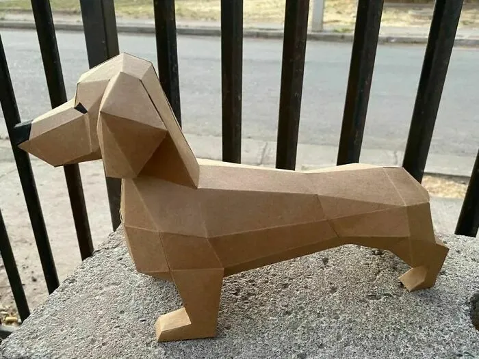 a brown dog made out of a paper