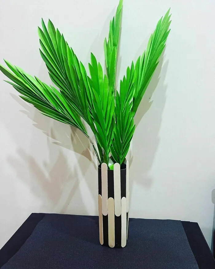 a green paper plant in a pot