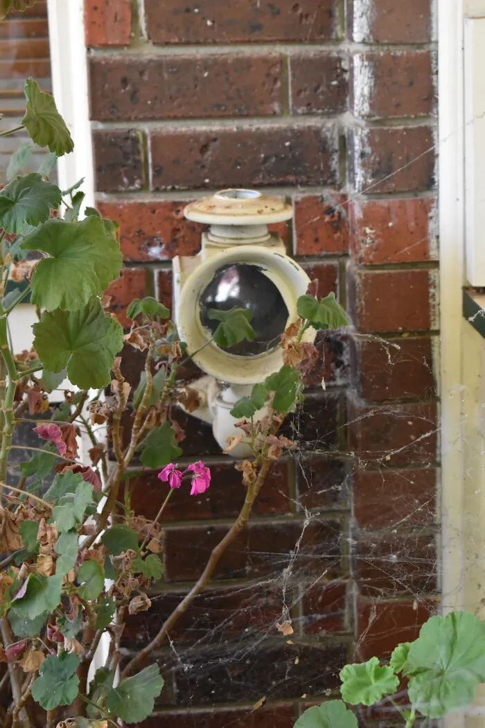 Coach Lamp That Was Built And Wired Into A Front Wall. (Ignore The Spider Webs, This Was Taken When My Family Were In The Midst Of Moving Out)