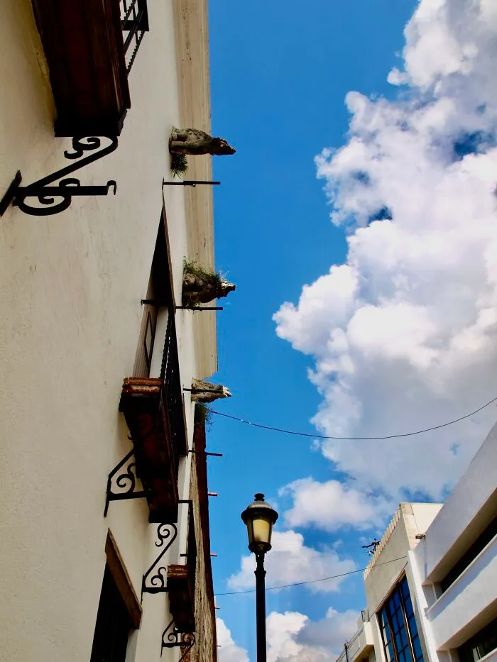 Casa De Gargolas (House Of The Gargoyles) Seemingly Blowing The Clouds Away