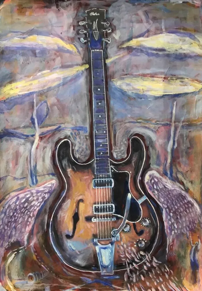 The Guitar Gently Weeps With A Soft Hand