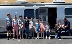 Family Of 12 Shows How They Manage To Travel In A 30-Foot Trailer And People Online Don't Approve