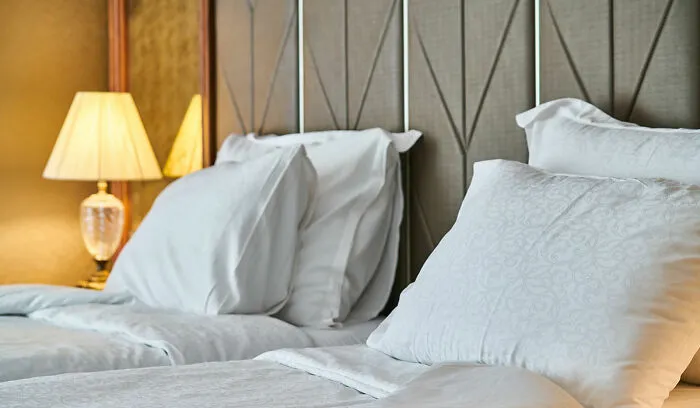 Bed with white sheets