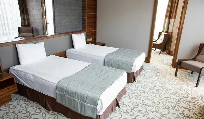Two separate beds in hotel room