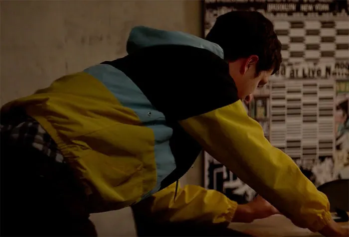 Michael Cera looking at table in movie This is the End