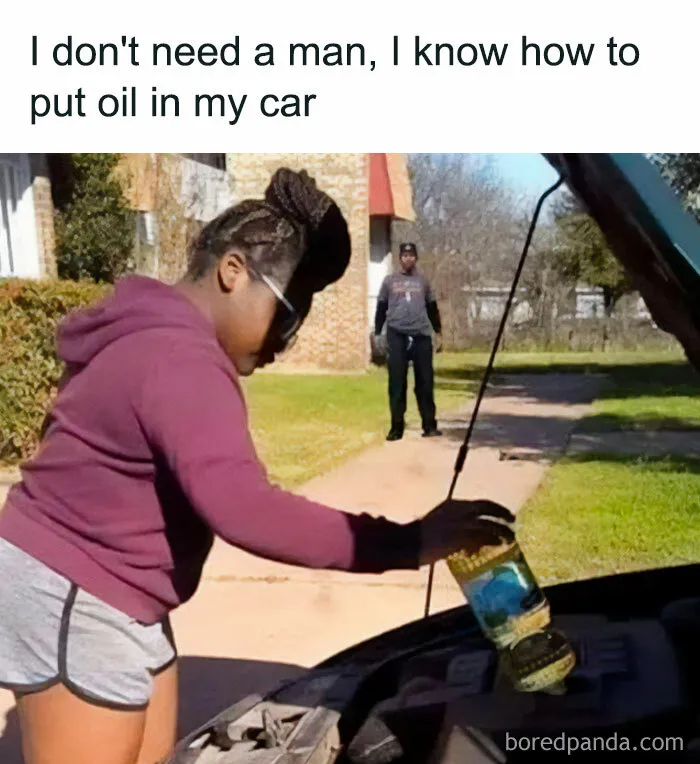 Woman humorously pouring cooking oil into a car, illustrating a classic dad joke.