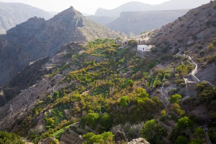Photo of white building in the mountains
