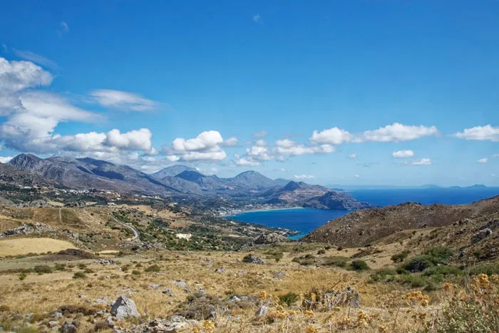 Photo of blue ocean and mountains view