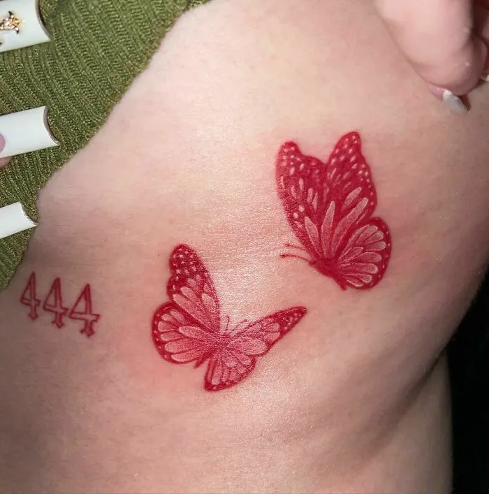 Red Ink Butterfly And Angel Numbers Tattoo