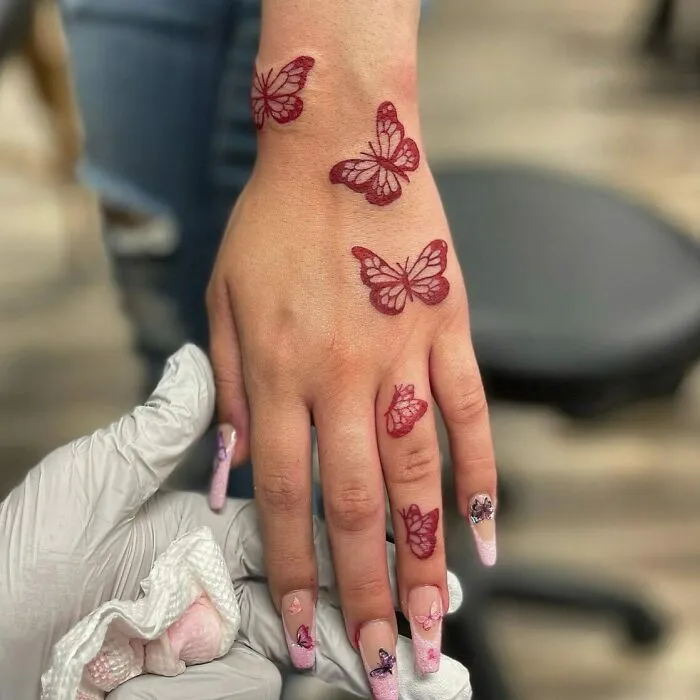 Red Ink Butterflies Tattoo