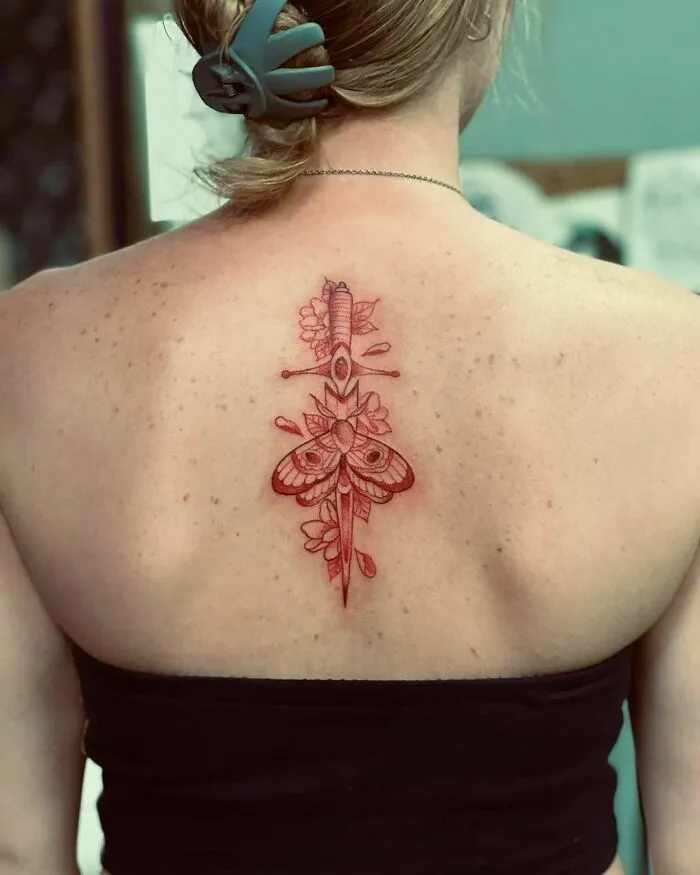 Dagger And Moth Red Ink Tattoo