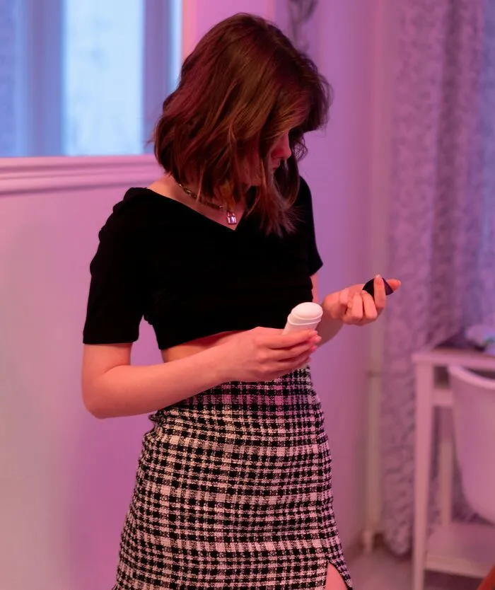 Girl Opening Deodorant 