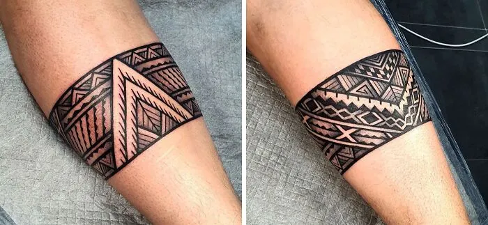 Intricate tribal lower leg tattoos with bold geometric patterns.