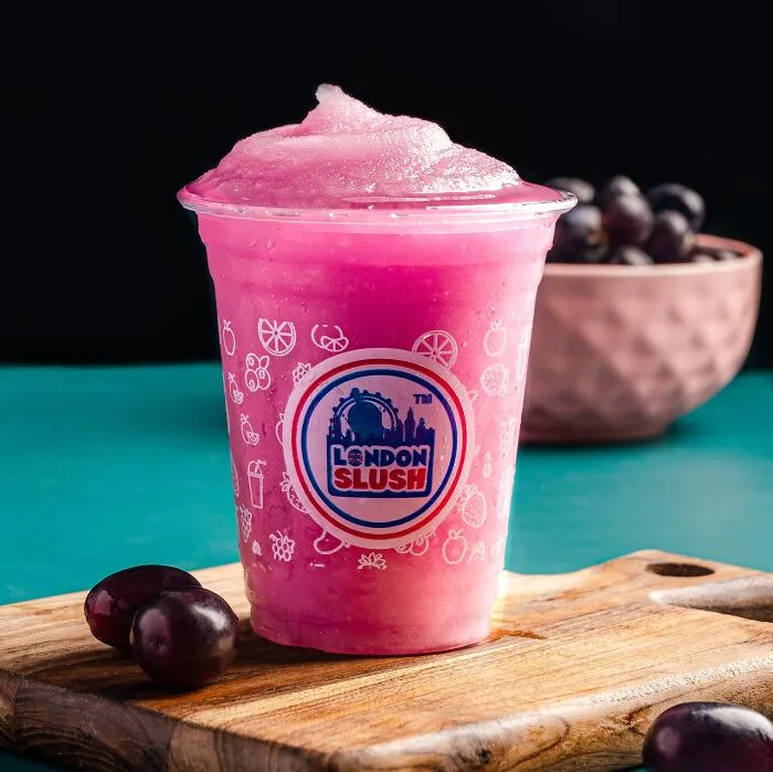 A Man Put Few Bottles Of Soda In The Freezer Resulting In A Frozen Slushy-Like Drink