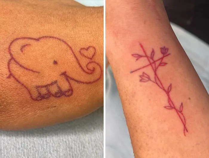 Red ink tattoos: elephant with heart and floral branch designs on skin.