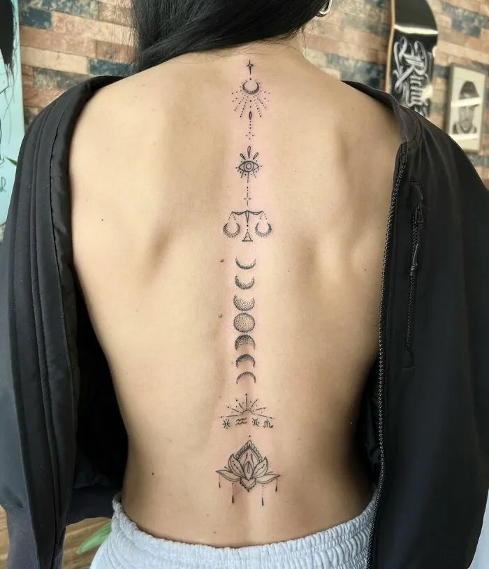 Spiritual Spine Tattoo With A Lotus Flower