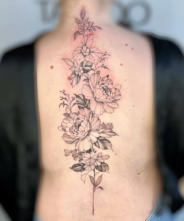 Blooming Spine Piece Expressing Femininity