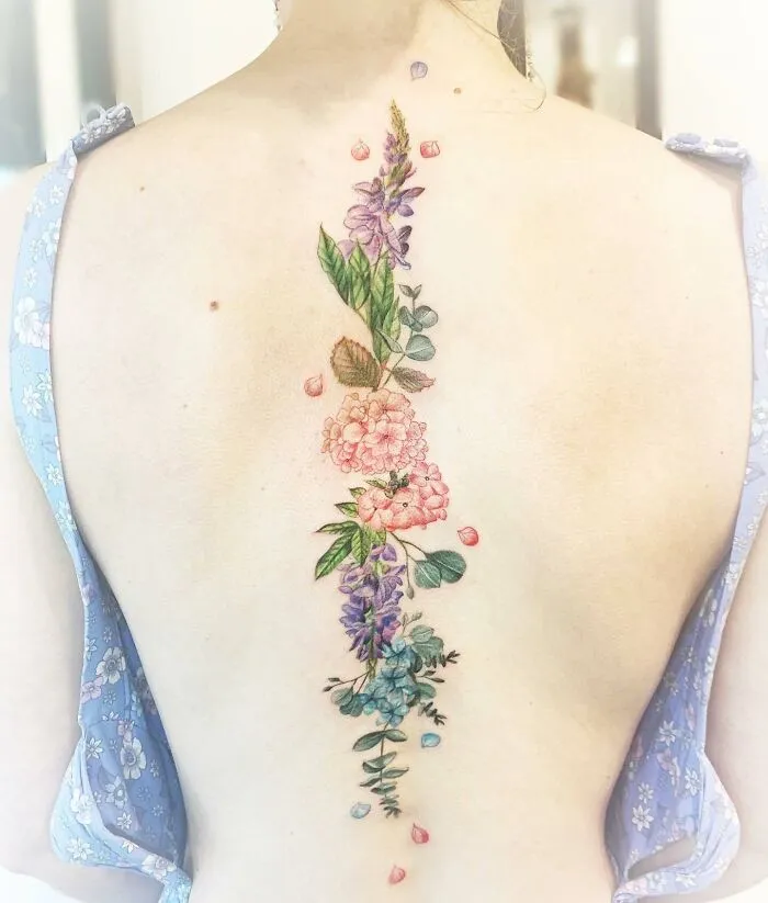 Delicate Floral Spine Tattoo