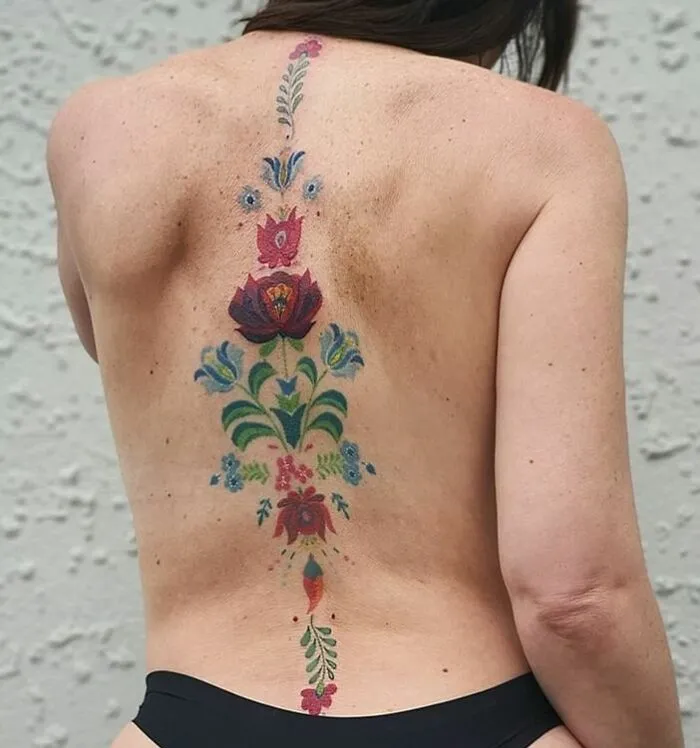 Hungarian Spine Tattoo