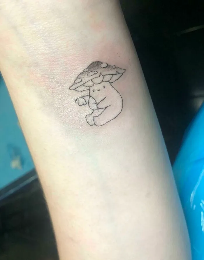 Mushroom Guy Tattoo On Wrist