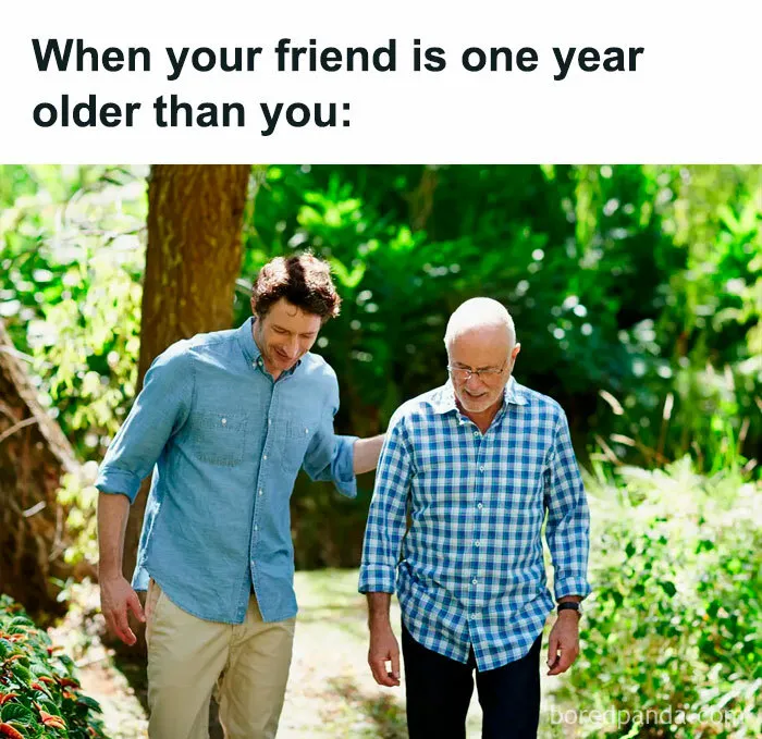 Two men walking in a garden, with text above humorously saying, "When your friend is one year older than you." Sarcastic meme.