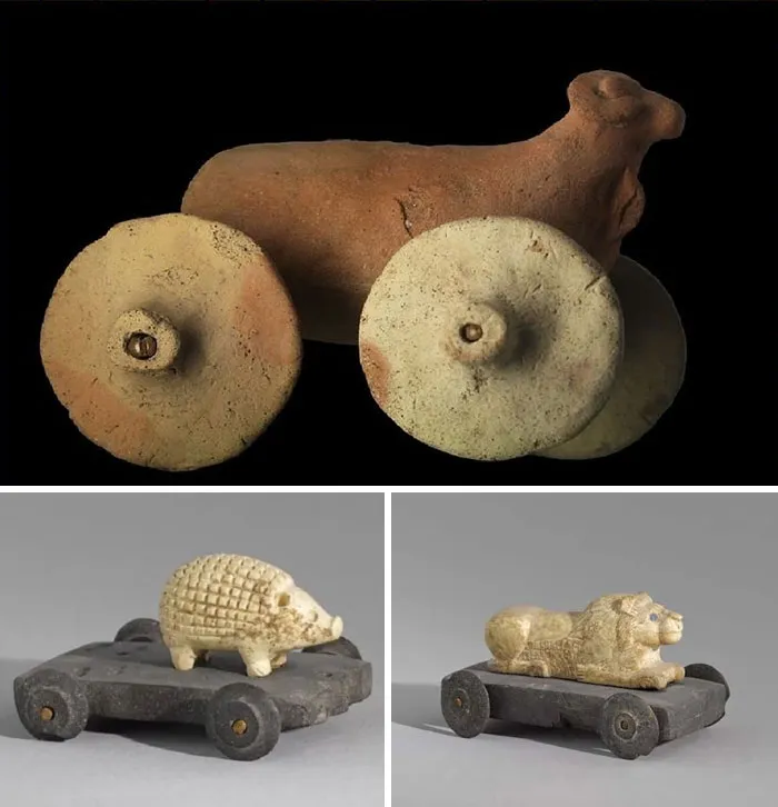 Over 3000 Years Old Animal Figurines Mounted On Little Carriages Are Described As Prehistoric Children Toys On Display At The Louvre Museum In Paris
