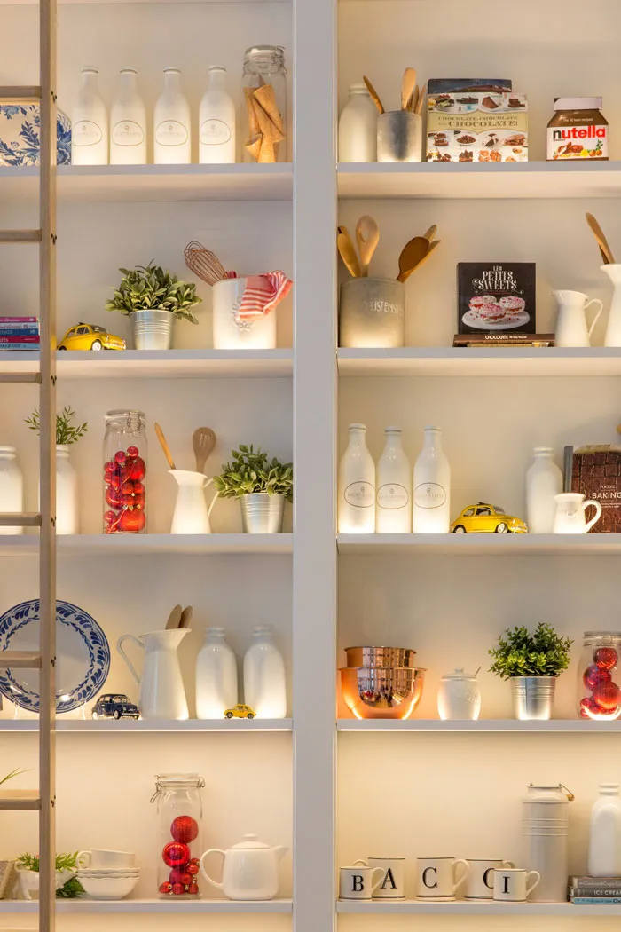 Home decoration ideas with stylish kitchen shelves, plants, and accessories.
