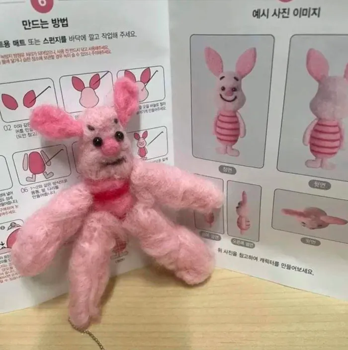 Homemade pink plush toy resembling a character, with instructions, capturing an important image of crafting gone wrong.
